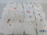 a lot of t - shirts that are stacked on top of each other