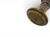 a close up of a brass door handle on a white background