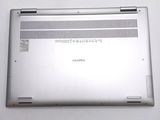 a laptop that is sitting on a white table