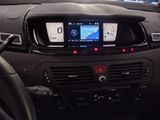 the dashboard of a car with a digital display in the center
