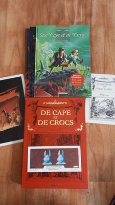 three children ' s books are sitting on a table next to each other