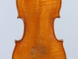 an old violin with a wooden back and a long neck