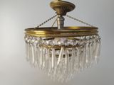 a chandelier hanging from the ceiling in a room