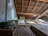 a dirty room with a lot of dirt on the floor