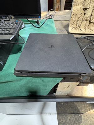two laptops and a keyboard on a table