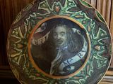 a plate with a picture of a man on it