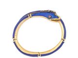 a close up of a bracelet with a snake on it