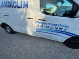 a van that is parked in the parking lot