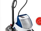 a blue and white vacuum cleaner with a red button