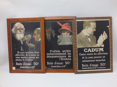 trois affiches encadrées représentant des hommes barbus et coiffés d'un chapeau, accrochées au mur