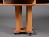 an image of a wooden table with wheels on it
