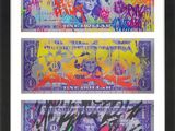 a picture of two different colored bills with graffiti on them