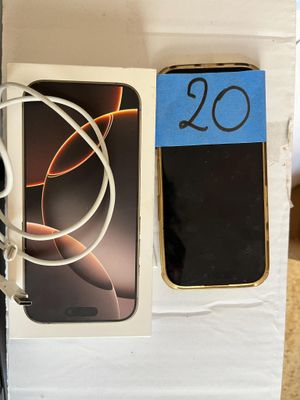 deux téléphones portables qui se trouvent dans une boîte