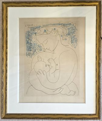 painting of a woman holding a baby in her arms in a gold frame
