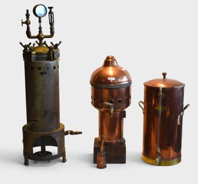 three different types of copper pots on a white background