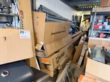 a large amount of boxes and other items in a warehouse