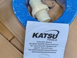 a blue plastic bowl with a bottle of water in it and a blue plastic bowl with a bottle of water in it sitting on a cardboard box