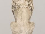 sculpture of a bust of a man with a lion ' s head on a wooden table