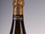 a bottle of wine that is sitting on a table