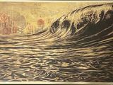 une photo d'un tableau représentant une vague dans l'océan