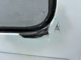 a close up of a dirty window of a car
