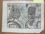 un vieux dessin représentant le plan d'une ville sur un bout de papier