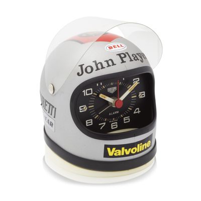 a close up of a clock with a helmet on it