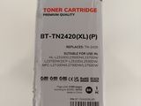 a close up of a black toner cartridge on a white background