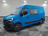 the blue van is parked on a checkered tile floor