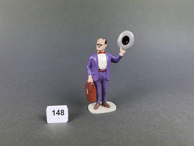a figurine of a man in a purple suit holding a hat and a suitcase