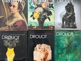 four books of drouot and drouot are sitting on a table
