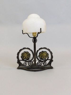 wrought iron and glass table lamp with a white glass shade