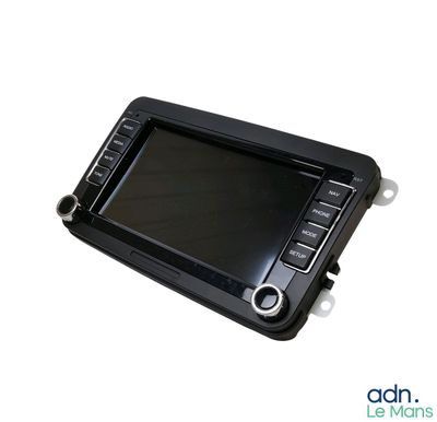 an image of a picture of a car radio that is on a table