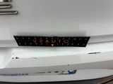 the front bumper of a white car with a sticker that says vrauto