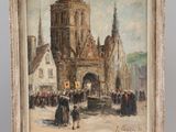 painting on easel of a street scene with a church in the background
