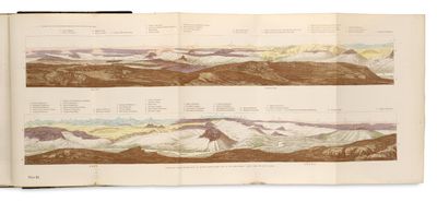 an open book with a drawing of a mountain range in the middle