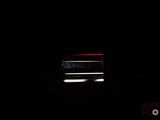 an image of a bench in the dark at night