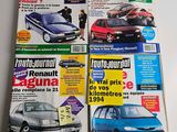 four magazine covers of different cars on display on a table