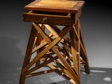 an image of a wooden stool sitting on top of a table