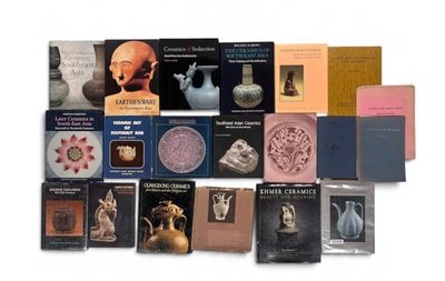a lot of books that are sitting on a table