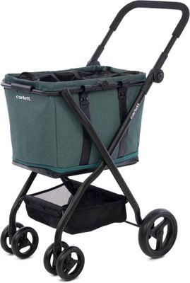 a close up of a green shopping cart on a white background