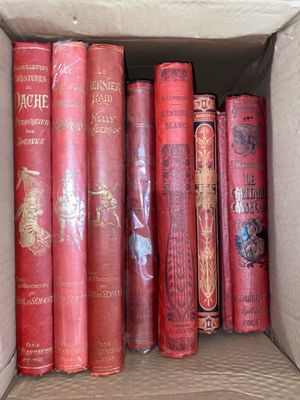 a box full of books that are sitting on a table