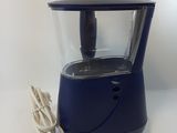 a blue blender with a cord attached to it