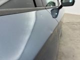 a rear view mirror on the side of a car