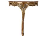 une table console en or avec un plateau en marbre sur fond blanc