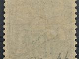 an old stamp with a small stamp on it