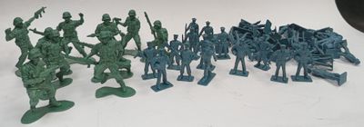 a lot of toy soldiers that are on the table