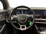 the interior of a car with a steering wheel and dashboard