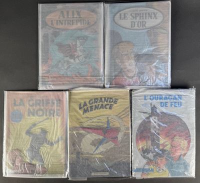 six comics are stacked on top of each other on a table