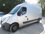 a white van that is parked in a parking lot